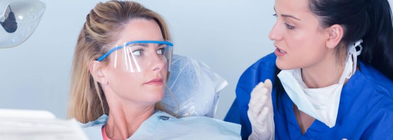 Dental consultation between patient and dentist.