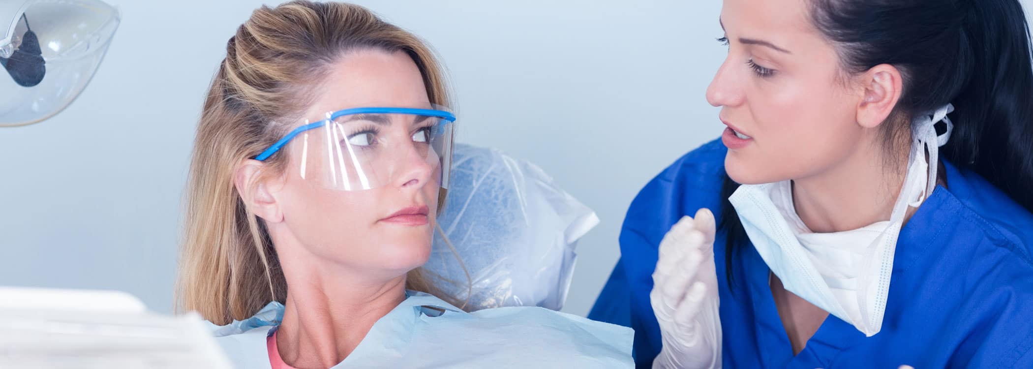 Dental consultation between patient and dentist.