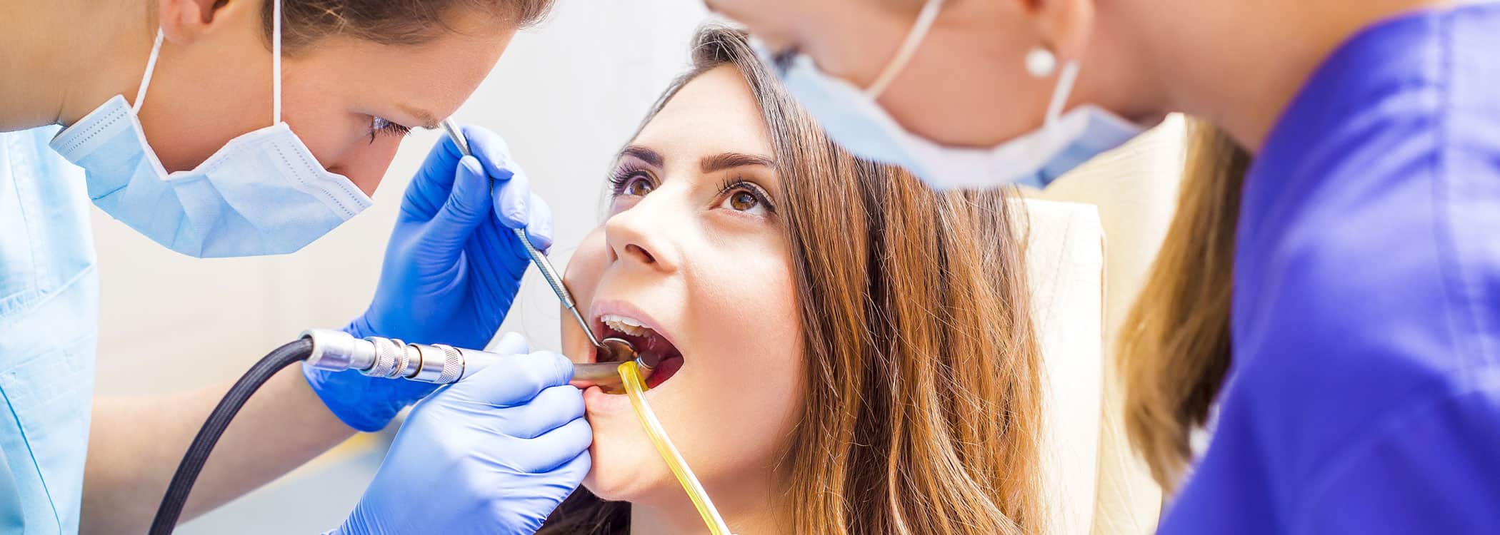 Dental Sealants being applied to a patient.